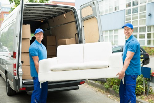 Professional house removals in Shoreditch with moving boxes and furniture