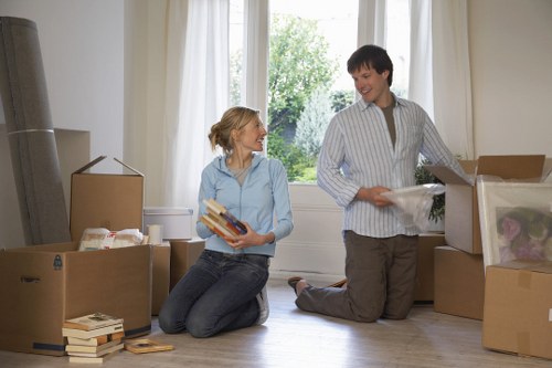 Professional movers handling furniture in an urban Shoreditch setting